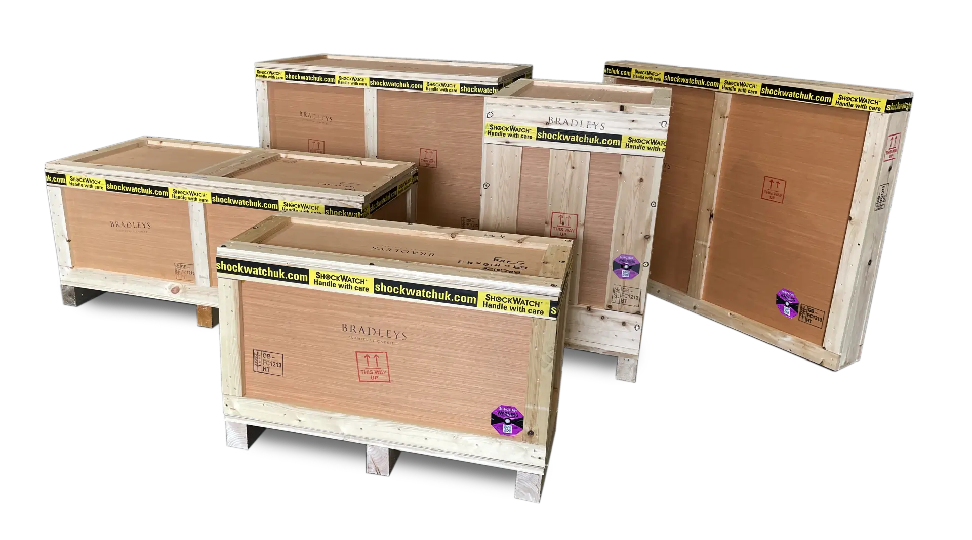 Photograph of various bespoke crates crafted by Bradleys, showcasing the range of crate sizes and types available at Bradleys Furniture Carriers