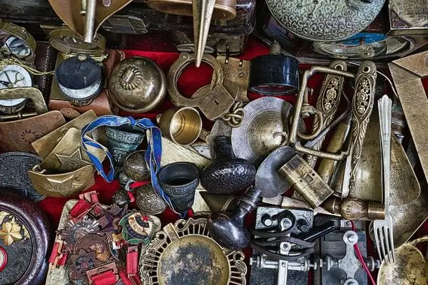 A collection of small antiques laid out covering the screen