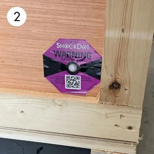 Step 2: Locate the shockwatch indicator and inspect for signs of impact.