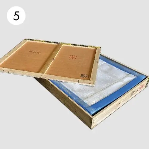 Step 5: Remove the front panel and take the painting out of the wooden case.